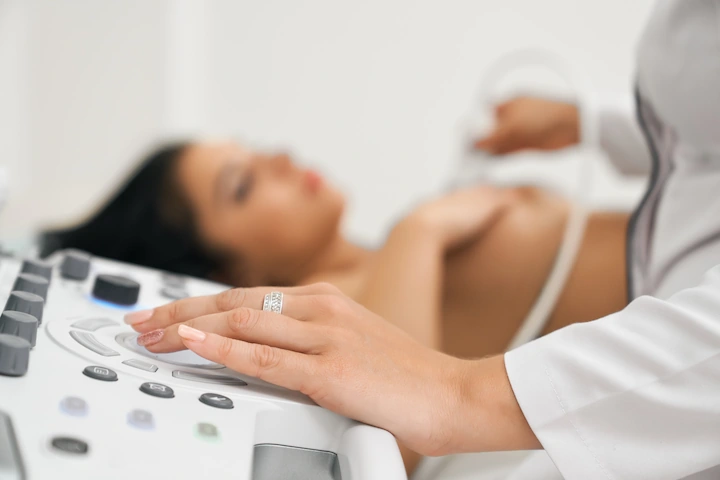 Woman receiving a breast scan
