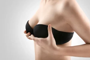 Woman showing her breast lift