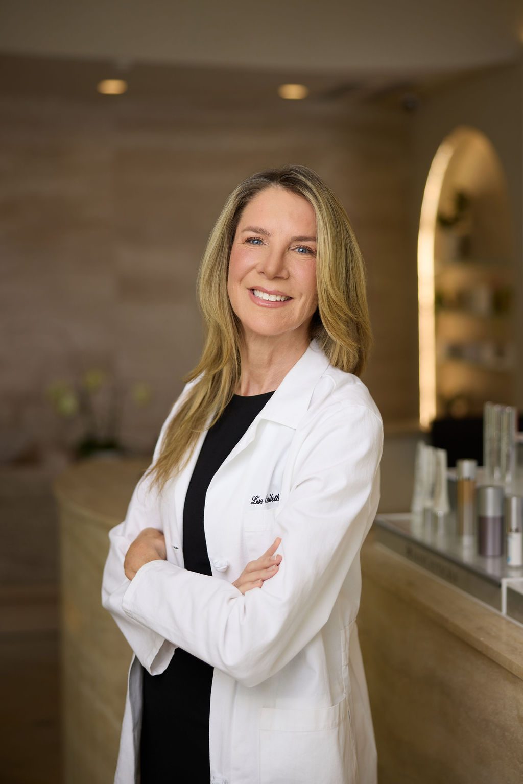 Dr. Lisa Cassileth in white coat